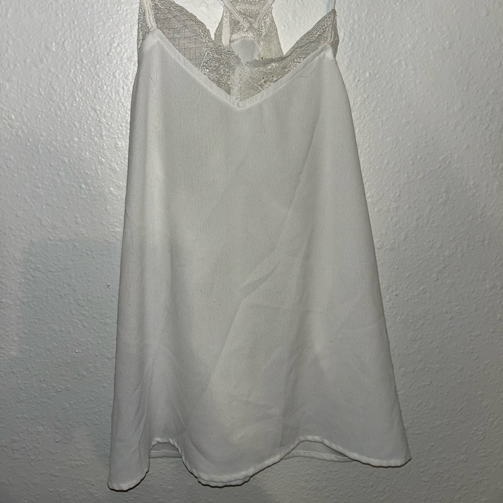 White tank top from Cavenders. Small fits medium.